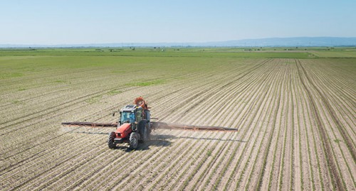 tractor-spraying-industrial-ag