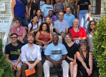 CTHG attendees at a conf fieldtrip, caption: Conference attendees on a field trip to then Field Green Duke House of Soul City exploring Economic and Environmental Resilience and Innovation. Photo courtesy of CTHG's Facebook Page