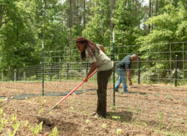 190523-reparations-black-farmers-us-presidential-candidates-land-access-justice-3-raking