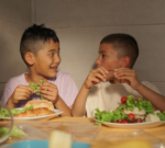 Kids eating salad