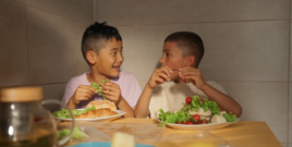 Kids eating salad