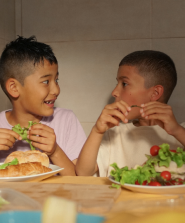 Kids eating salad