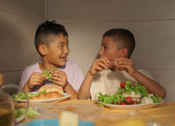 Kids eating salad