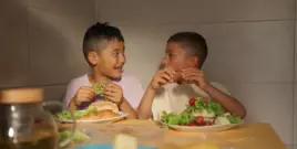 Kids eating salad