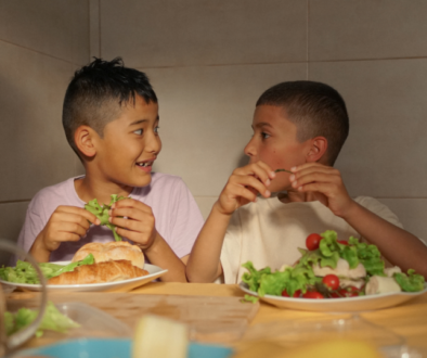 Kids eating salad