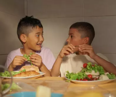Kids eating salad