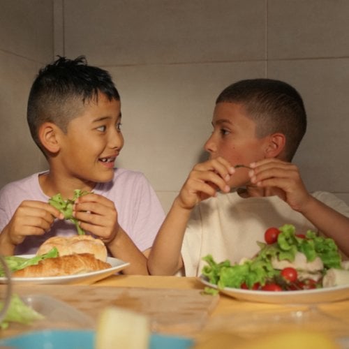 Kids eating salad
