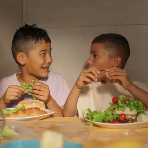 Kids eating salad
