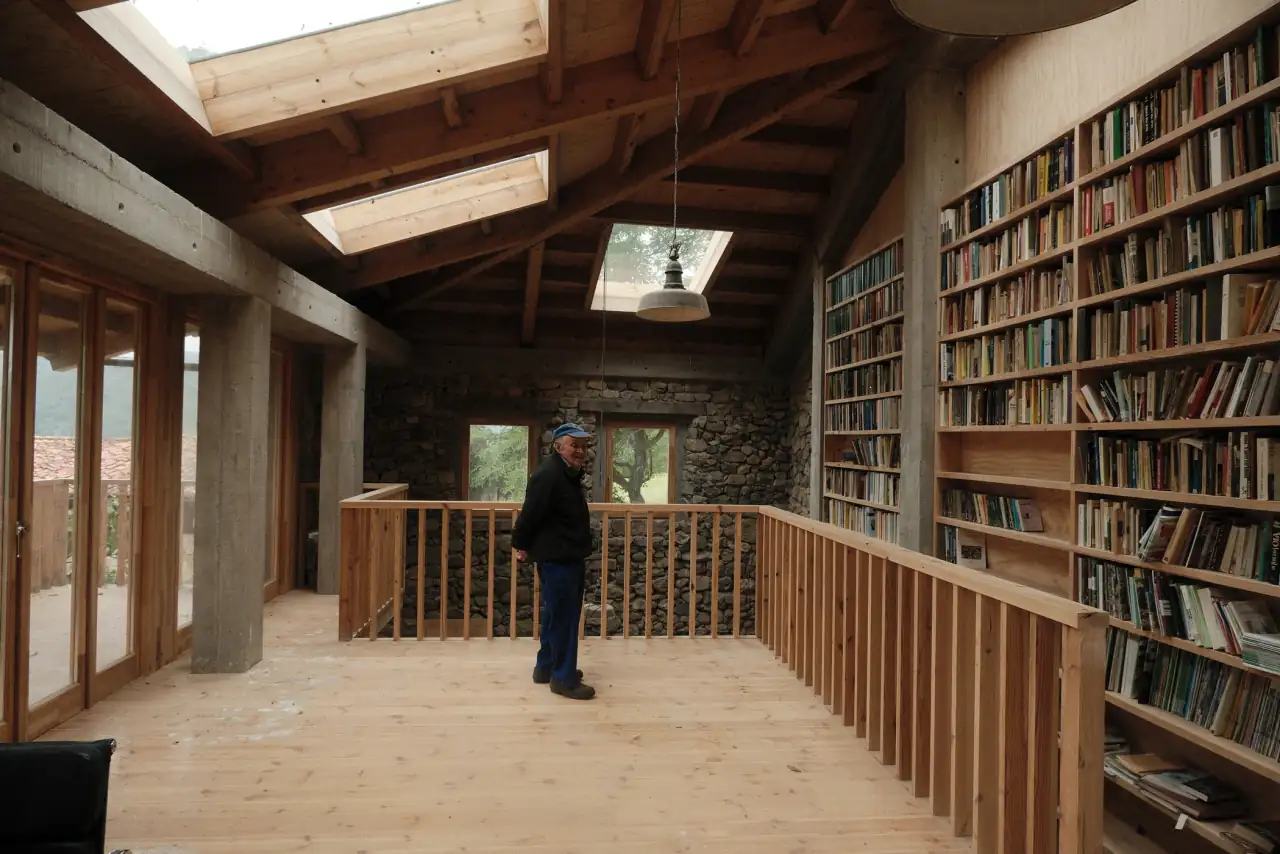 Village Elder in Shepherd School Library. Photo Credit: Melanie Marques
