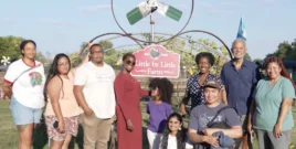 Group of people gathered at a community food justice event.