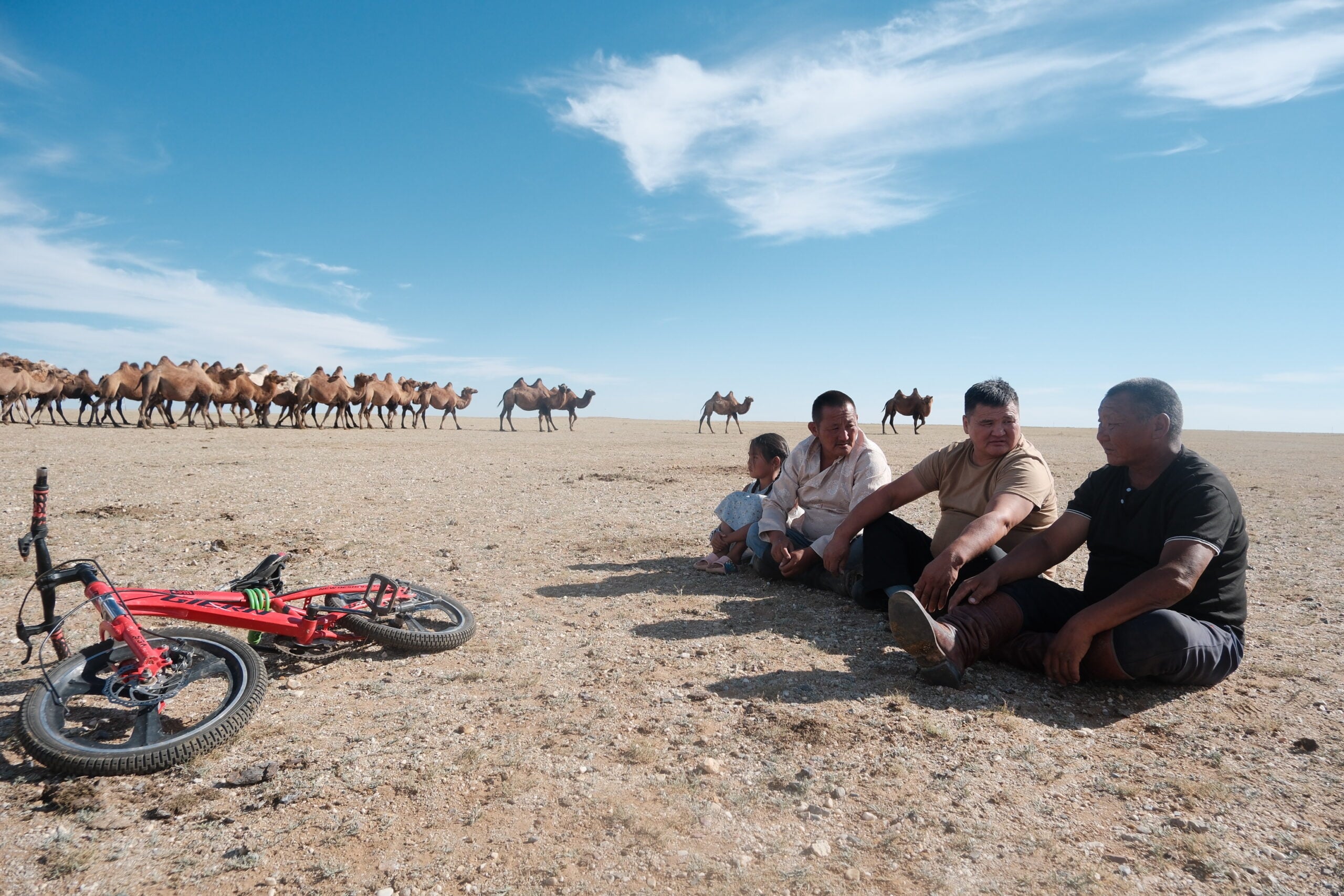 Mongolian camel shepherds in the Govisumber provence. Photo Credit: Melanie Marques